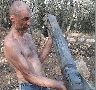Игорь Улогов с осколком ракеты