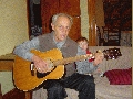 Это мой самый младший внук.
			Он познаёт гитары звук.
			Его все Данечкой зовут
			И ему песенки поют.
					Август 2007 года.