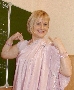 Актриса Лариса Ивлиева (арт-дуэт "Странники") в сари после успешного выступления на фестивале восточных танцев в г. Минске 2013 года. Лариса Ивлиева входит в состав танцевальной группы "Мэгивей".